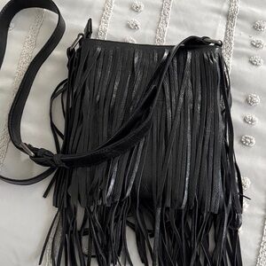 Cross body bag with fringe